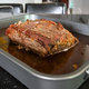 Beef in roasting pan juices